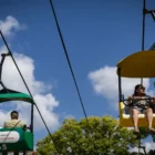 Fairgoers explore food stands and novelty items at the Minnesota State Fair opening day