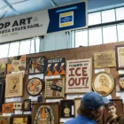 Colorful crop art pieces made from seeds and grains on display at the Minnesota State Fair