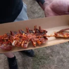 Fair food stands at the New York State Fair featuring unusual fried snacks and colorful desserts