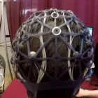 A Minnesota State Fair research booth where volunteers play Tetris while wearing a brain-monitoring cap